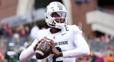 Michigan State Spartans quarterback Aidan Chiles (2) warms up before the game against the Minnesota Golden Gophers at Huntington Bank Stadium. - Matt Krohn, USA TODAY Sports