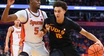 Dec 2, 2025; Syracuse, New York, USA; Tennessee Volunteers forward Nate Ament (10) drives against Syracuse Orange forward Tyler Betsey (5) during the first half at the JMA Wireless Dome. Mandatory Credit: Rich Barnes-Imagn Images