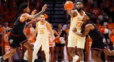 Tennessee forward Jaylen Carey (23) gets the turnover while defended by Louisville guard Ryan Conwell (3) during a college basketball game between Tennessee and Louisville held at Thompson-Boling Arena at Food City Center in Knoxville, Tenn., on Dec. 16, 2025.
