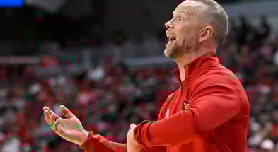Dec 20, 2025; Louisville, Kentucky, USA; Louisville Cardinals head coach Pat Kelsey calls out instructions during the first half agains the Montana Grizzlies at KFC Yum! Center. Louisville defeated Montana 94-54. Mandatory Credit: Jamie Rhodes-Imagn Images