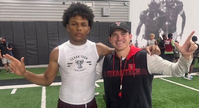 Josiah Walker with Texas Tech assistant coach Garret McGuire