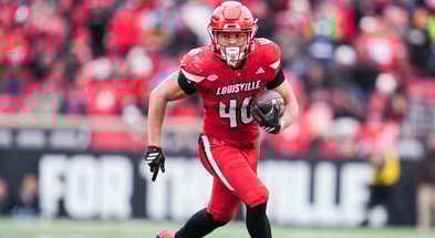 Louisville Cardinals running back Braxton Jennings (46) runs for a gain against Kentucky as the Louisville Cardinals football team dominated the Wildcats 41-0 Saturday, November 29, 2025 in Louisville, Kentucky at L&N Federal Credit Union Stadium.