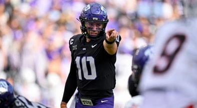 Nov 29, 2025; Fort Worth, Texas, USA; TCU Horned Frogs quarterback Josh Hoover (10) sets the play during the game between the Horned Frogs and the Bearcats at Amon G. Carter Stadium. Mandatory Credit: Jerome Miron-Imagn Images