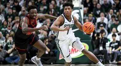 Michigan State's Jeremy Fears Jr., right, moves the ball as Cornell's DJ Nix defends during the first half on Monday, Dec. 29, 2025, at the Breslin Center in East Lansing. - Nick King, USA TODAY Sports