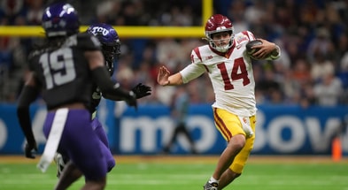 USC Trojans quarterback Jayden Maiava (14) carries the ball against the TCU Horned Frogs in the second half during the Alamo Bowl at Alamodome