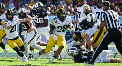 The Hawkeyes earn a win over Vanderbilt in the ReliaQuest Bowl. (Photo by Dennis Scheidt)