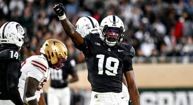 Michigan State's Armorion Smith celebrates after tackling Boston College's Lewis Bond during the first quarter on Saturday, Sept. 6, 2025, at Spartan Stadium in East Lansing. - Nick King, USA TODAY Sports