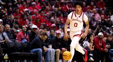 Louisville Cardinals guard Mikel Brown (0) handles the ball in the first half of the NCAA Basketball game between Louisville Cardinals and Cincinnati Bearcats at Heritage Bank Center in Cincinnati on Nov. 21, 2025.