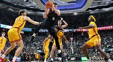 Ringed by Southern California Trojans defenders, Michigan State Spartans forward Jaxon Kohler (0) comes down with an offensive rebound during the second half at Jack Breslin Student Events Center. - Dale Young, USA TODAY Sports