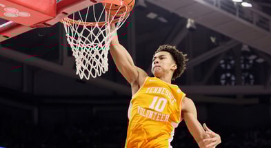Jan 3, 2026; Fayetteville, Arkansas, USA; Tennessee Volunteers forward Nate Ament (10) dunks the ball in the first half against the Arkansas Razorbacks at Bud Walton Arena. Mandatory Credit: Nelson Chenault-Imagn Images