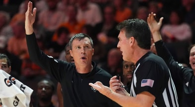 Texas A&M basketball coach Bucky McMillan looks at the referee asking to a foul to be called during a NCAA basketball game between Tennessee and Texas A&amp;M at Thompson-Boling Arena at Food City Center in Knoxville, Tenn., on Jan. 13, 2026.