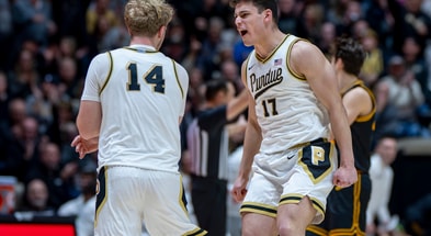Purdue's Jack Benter and Omer Mayer