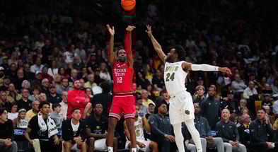 Jan 10, 2026; Boulder, Colorado, USA; Texas Tech Red Raiders forward Donovan Atwell (12) shoots the ball over Colorado Buffaloes guard Barrington Hargress (24) during the first half at the CU Events Center. Mandatory Credit: Ron Chenoy-Imagn Images