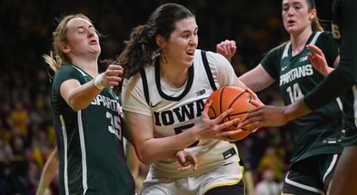 The Hawkeyes defeated the 15th-ranked Spartans on Sunday night. (Photo by Dennis Scheidt)