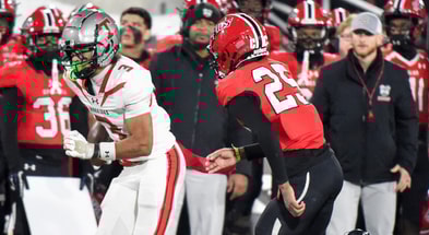 Thompson's wide receiver Darion Moseley (3) carries against Opelika defensive back Jamel Griffin (25) during their AHSAA 7A Football State Championship game in Birmingham, Ala. on Wednesday December 3, 2025. © Mickey Welsh / Advertiser / USA TODAY NETWORK via Imagn Images