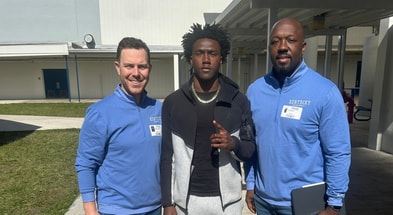 Kentucky head coach Will Stein and WR coach Joe Price meet with Anthony Jennings (Photo provided by Anthony Jennings)