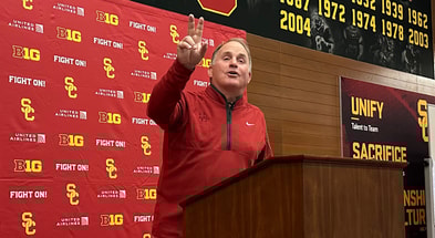 USC defensive coordinator Gary Patterson flashes a fight on during his introductory press conference