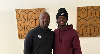 Kentucky wide receiver coach Joe Price with Lawrence Britt (Photo provided by Lawrence Britt)