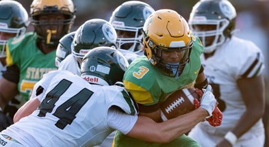 Trinity's Nick Lococo (44) tackles Bryan Station's Jordan Haskins (3) during their game on Friday, Aug. 23, 2024 at Bryan Station High School in Lexington, Ky. © Clare Grant/Courier Journal / USA TODAY NETWORK