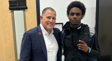 2027 wide receiver recruit Zion Vilma with Greg Schiano