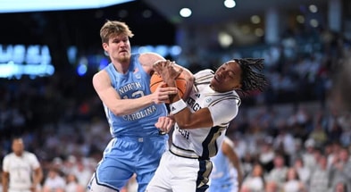 UNC's Henri Veesar and GT's Akai Fleming