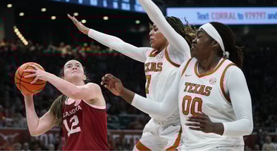 Feb 1, 2026; Austin, Texas, USA; Oklahoma Sooners guard Payton Verhulst (12) shoots the ball against Texas Longhorns guard Jordan Lee (7) and center Kyla Oldacre (00) during the first half at Moody Center. Mandatory Credit: Dustin Safranek-Imagn Images
