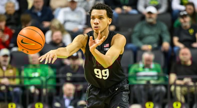 Michigan State Spartans guard Divine Ugochukwu (99) passes the ball during the second half against the Oregon Ducks at Matthew Knight Arena. - Craig Strobeck, USA TODAY Sports