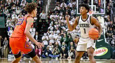 Michigan State's Jeremy Fears Jr., right, signals to teammates as Illinois' Keaton Wagler defends during the second half on Saturday, Feb. 7, 2026, at the Breslin Center in East Lansing. - Nick King, USA TODAY Sports