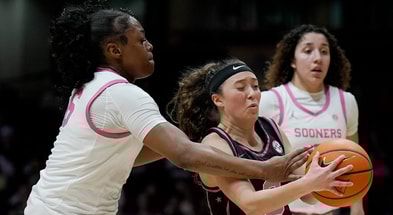 Vanderbilt guard Aubrey Galvan (3) drives past Oklahoma forward Sahara Williams (6) during the first half of an NCAA college basketball game at Memorial Gymnasium Monday, Feb. 9, 2026, in Nashville, Tenn.