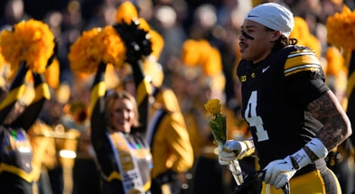 Iowa Hawkeyes defensive back Koen Entringer (4) runs onto the field during senior recognition Nov. 22, 2025 at Kinnick Stadium in Iowa City, Iowa.