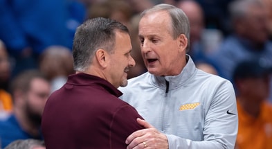 Tennessee Volunteers head coach Rick Barnes, right, congratulates Mississippi State Bulldogs head coach Chris Jans on his team's win over the Volunteers during their SEC Men's Basketball Tournament quarterfinal game at Bridgestone Arena in Nashville, Tenn., Friday, March 15, 2024.