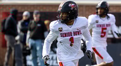 Jan 29, 2026; Mobile, AL, USA; National wide receiver Caullin Lacy (1) of Louisville runs a route during National Senior Bowl practice at Hancock Whitney Stadium. Mandatory Credit: Vasha Hunt-Imagn Images