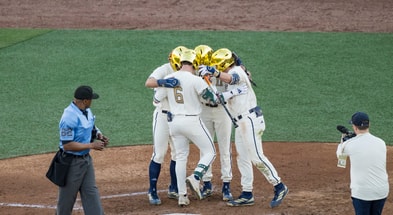 Georgia Tech players at home plate vs. Bowling Green