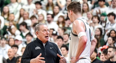 Michigan State's head coach Tom Izzo, left, talks with Jaxon Kohler UCLA's during the first half on Tuesday, Feb. 17, 2026, at the Breslin Center in East Lansing. - Nick King, USA TODAY Sports