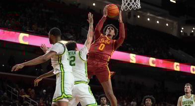 USC Trojans guard Alijah Arenas (0) shoots the ball against Oregon Ducks guard Drew Carter (12) in the second half at Galen Center