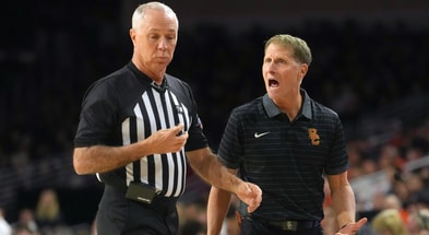 USC Trojans head coach Eric Musselman yells at referee Jason Phillips in the first half against the Illinois Fighting Illini at Galen Center
