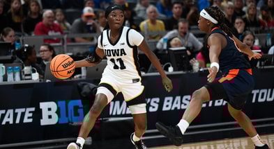 The Hawkeyes defeated the Illini on Friday night in Indy. (Photo by Dennis Scheidt)