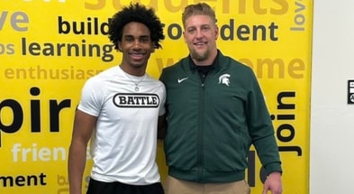 Lundon Hampton with Michigan State LB coach Max Bullough (Photo via social media)