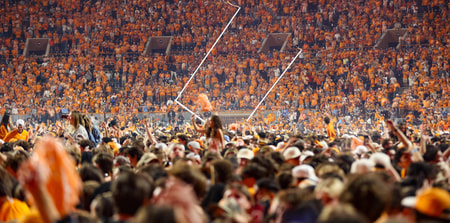 Tennessee fans celebrate beating Alabama. Credit: Randy Sartin-Imagn Images