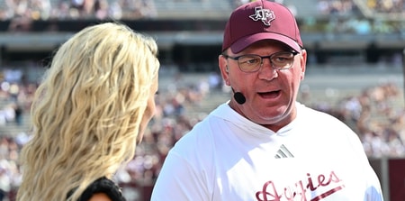 Mike Elko pushes back on regular season games meaning less with expanded playoff