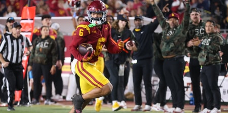 USC receiver Makai Lemon runs for a touchdown during a game against the Rutgers Scarlet Knights