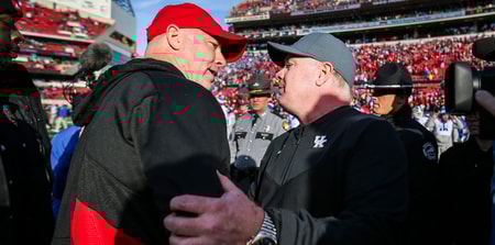 Louisville''s Jeff Brohm and Kentucky head coach Mark Stoops after the Governor's Cup,