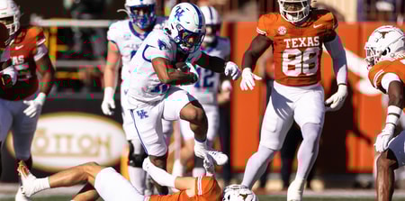 Nov 23, 2024; Austin, Texas, USA; Kentucky Wildcats running back Jamarion Wilcox (10) runs the ball against the Texas Longhorns during the first quarter at Darrell K Royal-Texas Memorial Stadium. Mandatory Credit: Brett Patzke-Imagn Images