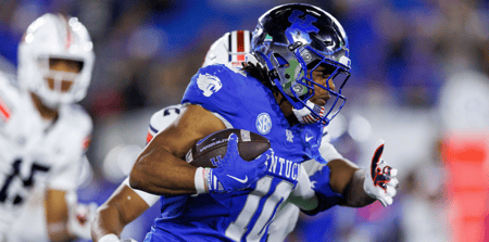 Oct 26, 2024; Lexington, Kentucky, USA; Kentucky Wildcats running back Jamarion Wilcox (10) carries the ball during the second quarter against the Auburn Tigers at Kroger Field. Mandatory Credit: Jordan Prather-Imagn Images