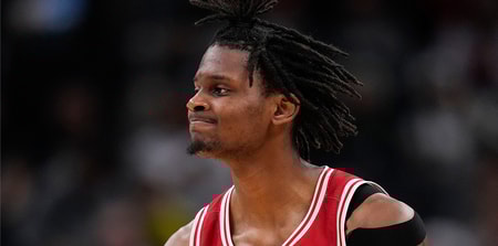 Wisconsin transfer Xavier Amos commits to Loyola Chicago