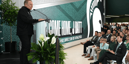 Michigan State University basketball coach Tom Izzo speaks Wednesday, June 4, 2025, before MSU President Kevin Guskiewicz introduced J Batt (bottom right) as the Spartans new athletic director. - Matthew Dae Smith