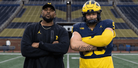 Alister Vallejo with Sherrone Moore