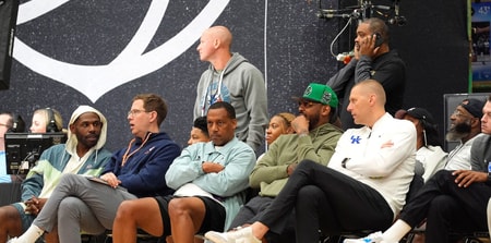 July 19, 2025; North Augusta, South Carolina, USA; NBA star Carmelo Anthony (center right) talks to University of Kentucky basketball coach Mark Pope (right) during the Team Why Not and Team CP3 game at the Nike EYBL Peach Jam at Riverview Park Activity Center. Team Why Not won 66-63. Mandatory Credit: Katie Goodale - Augusta Chronicle/USA TODAY NETWORK