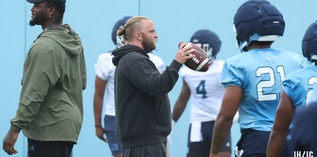 UNC defensive coordinator Steve Belichick and inside linebackers coach Jamie Collins