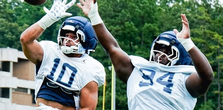 UNC defensive end Pryce Yates and defensive tackle Isaiah Johnson